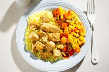 Wall Mural - Chicken with rice and vegetable salad 