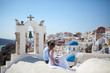 © Sahaidachnyi Roman - young couple honeymoon on the most romantic island Santorini, Greece