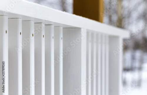 White Painted Wooden Deck Railing Selective Focus On Balusters