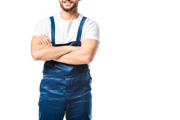 cropped view of mover in uniform with arms crossed isolated on white with copy space