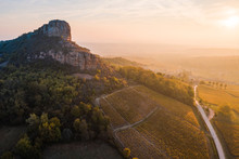 Aerial View Of Vineyard With Rock Of Solutre During Sunrise