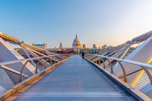 View of Millennium Bridge with St. Paul's Cathedral against clear sky