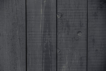Dark Gray Painted Rustic Fence. Dark Grey Wooden Boards Texture. Vintage Dark Gray Painted Rustic. Old Grey Wooden Board Background. Wood Gray Texture. Grey Wood Surface Background.