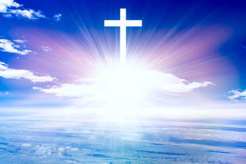 Heavenly Cross . Religion symbol shape .  Dramatic nature background  . Glowing cross in sky . Happy Easter. Light from sky . Religion background .  Paradise heaven . Light in sky .  