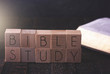 © pamela_d_mcadams - Bible Study Spelled in Block Letters on a \ Table with a Bible