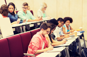 education, high school, university, learning and people concept - group of international students wi