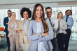 © Mediteraneo - Group of happy business people and company staff in modern office, representig company.Selective focus.