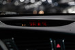 © Виталий Сова - Сlose-up of the car  black interior:    dashboard with watch, temperature,monitor.