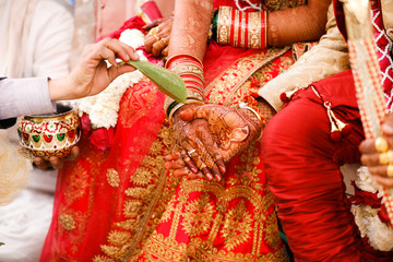 Indian wedding  photography ,groom and bride hands