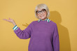 © Yakobchuk Olena - Cropped photo of happy stylish old lady gesticulating with arm in studio