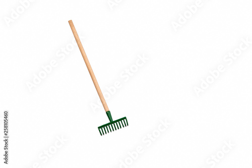 Fotomural Small gardening rake isolated on white background
