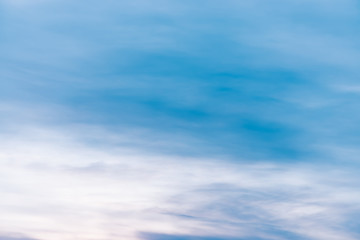 Wall Mural - sunset sky with pink lilac light clouds. colorful smooth blue white sky gradient. natural sunrise ba