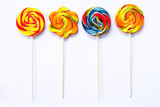 Fototapeta Tęcza - Set of colorful lollipops isolated on white background.