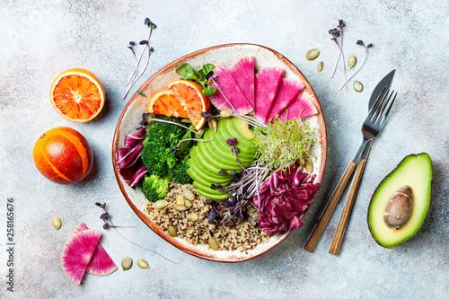 Fotografía Vegan, detox Buddha bowl with quinoa, micro greens, avocado, blood orange, broccoli, watermelon radish, alfalfa seed sprouts