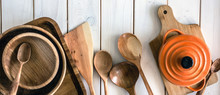Kitchen Utensils On Wooden Background. Kitchen Utensils Over Wood Background Wooden Table With Copy Space.Various Wooden Kitchen Utensils On Table Top View With Copy Space. Culinary Background. 