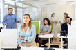 © JackF - Upset girl sitting at laptop in coworking space while dissatisfied businessman pointing out mistakes in her work