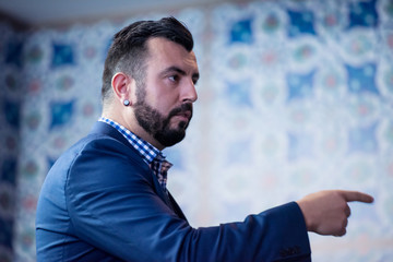 Wall Mural - successful businessman giving presentations at conference room