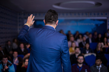 Wall Mural - successful businessman giving presentations at conference room