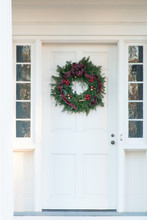Christmas Wreath On Old Door