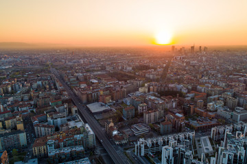 Wall Mural - Milan panoramic skyline at sunrise, aerial view.