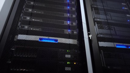 Wall Mural - server in data center. servers racks close up in modern data center. cloud computing datacenter serv