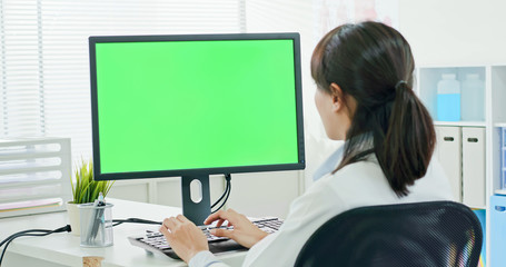 woman doctor use computer