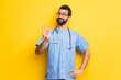 © luismolinero - Surgeon doctor man happy and counting three with fingers