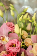  Bouquet with orchids and roses on a beautiful background