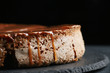 © northernrf - pie with caramel close up on dark background. cake with banana and caramel
