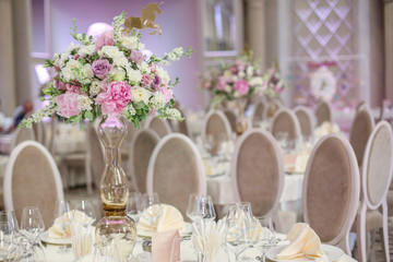 Beautiful flower decoration on a wedding table, selective focus