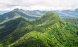 Mountains covered with pristine primary forest dominate the landscape in this aerial shot of the Cockscomb Basin, Belize.