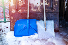 Set Of Tools For Snow Removal. Three Shovels From Different Materials. Spring Season