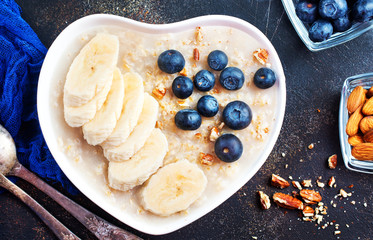 Wall Mural - oat flakes with berries