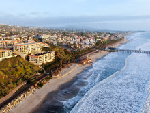 Aerial View Of San Clemente Pier With Beach And Coastline Before Sunset Time . San Clemente City In Orange County, California, USA. Travel Destination In The South West Coast. Famous Beach For Surfer.