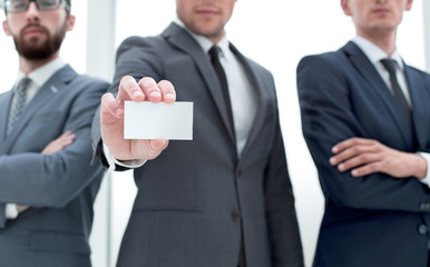 business team leader showing business card