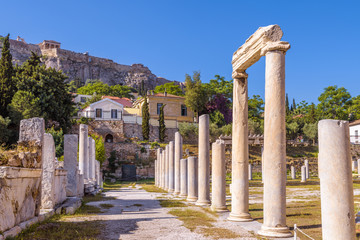 Wall Mural - Roman Agora overlooking Acropolis of Athens, Greece. It is an old landmark of Athens. Scenic view of Ancient Greek ruins in the Athens center near Plaka. Remains of the antique Athens city in summer. 