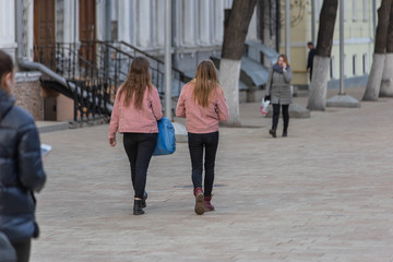 two girls are equally dressed