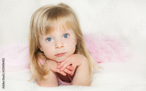Close Up Portrait Of Cute Blonde Toddler 2 Years Old Girl With