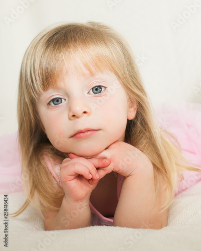Close Up Portrait Of Cute Blonde Toddler 2 Years Old Girl With