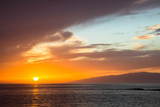 Fototapeta Zachód słońca - beautiful sunset over the Atlantic ocean at Costa Adaje, Tenerife Island, Spain