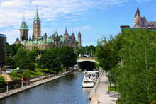 Looking Down A Boat Lined Rideau Canal Towards Parliament Hill, Ottawa, Ontario, Canada