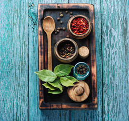 Canvas Print - Spices and herbs on kitchen table