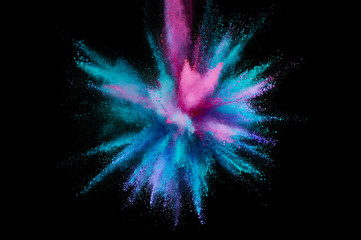 Wall Mural - Colored powder explosion. Abstract closeup dust on backdrop. Colorful explode. Paint holi