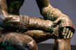Detail of the arms of an ancient roman bronze statue