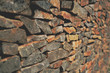 Old sunburnt brick wall from left perspective view