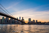 Fototapeta  - View of the Brooklyn bridge during a dusk from East river. New York City