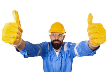 High angle portrait of handsome hipster bearded builder in hard hat and transparent safety glasses raising two thumbs up in working gloves, concept of success and approval, ok gesture. isolated