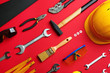 © New Africa - Flat lay composition with construction tools on color background