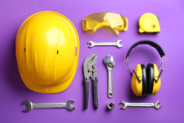 Wall Mural - Flat lay composition with different construction tools on color background