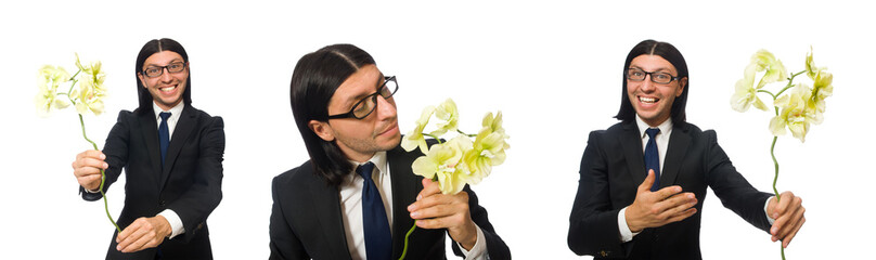 Wall Mural - Handsome businessman with flower isolated on white